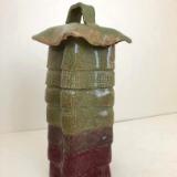 Green vessel with lid