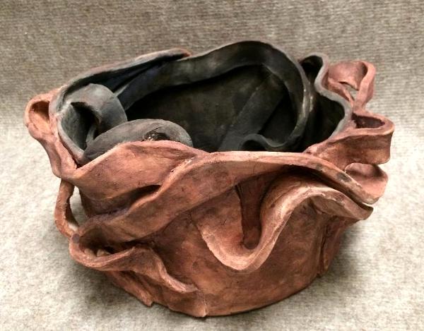 bowl with black and red oxide finish