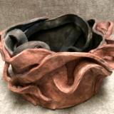 bowl with black and red oxide finish